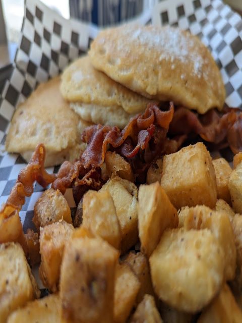 Pancakes with bacon and tater tots.